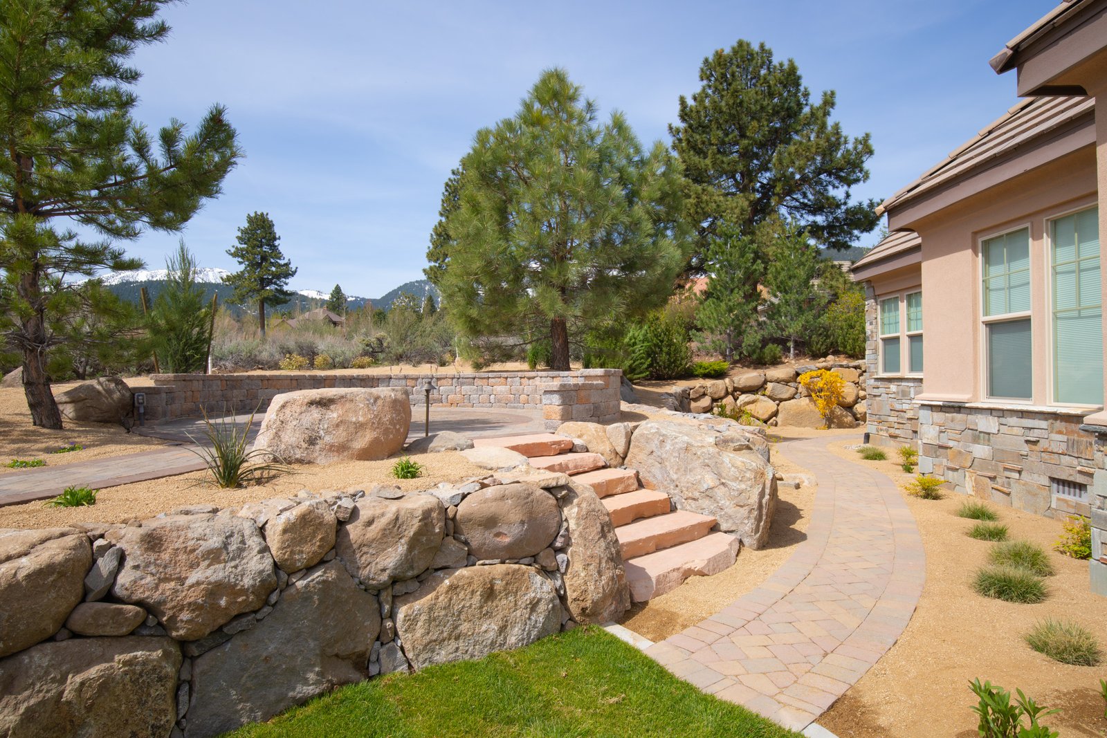 Design Build paver walkway, steps and boulder retainer wall, seat walls gail willey landscaping