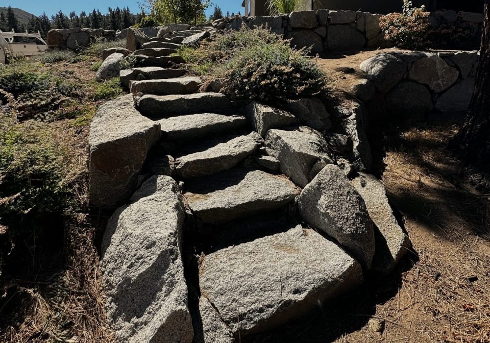 Boulders used as steppers to go from front to back yard.